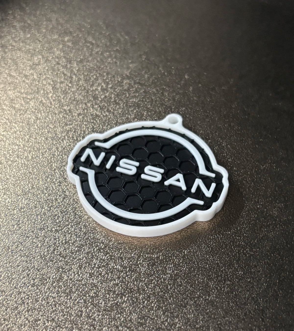 Premium Nissan Keychain – Honeycomb Pattern Edition